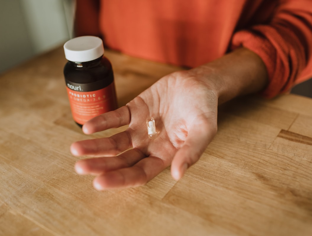 Man taking natural vitamins for health